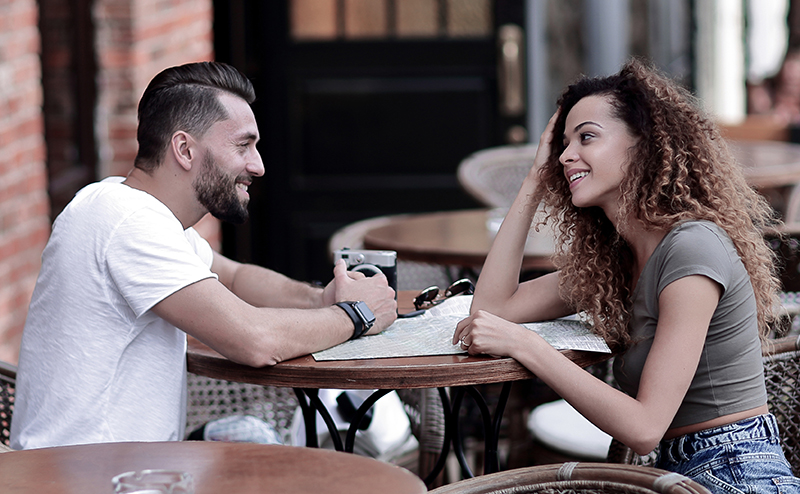 Couple sitting outside